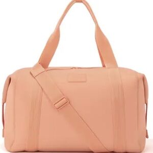Neoprene peach travel bag in lightly used condition